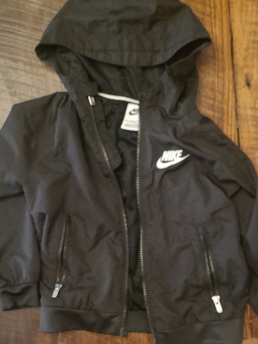 Nike Kids Black Hooded Rain Jacket with White Logo